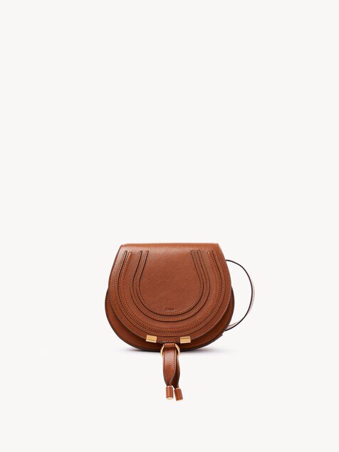 Small Marcie saddle bag in shiny leather