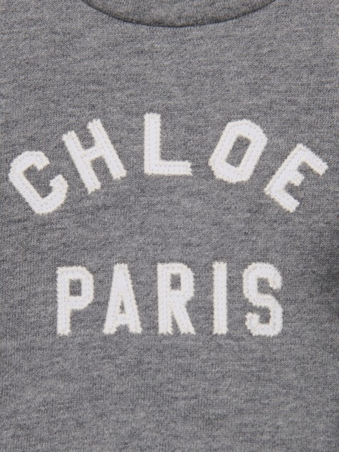 Sweat &agrave; volants et logo b&eacute;b&eacute;