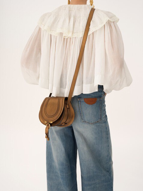 Small Marcie saddle bag in metallized leather