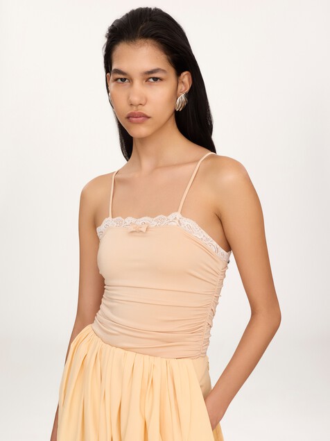 Ruched lace-trimmed bodysuit