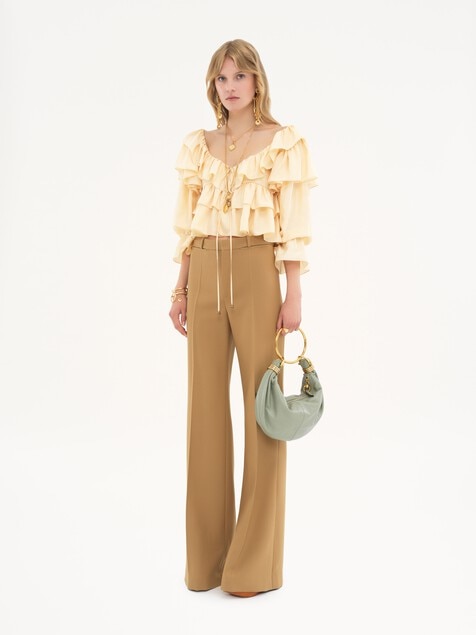 Flared tailored pants in wool grain de poudre