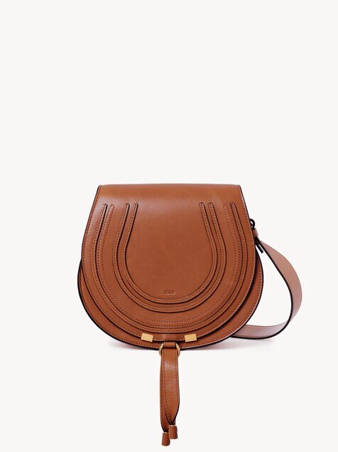 Bolso saddle Marcie de cuero brillante