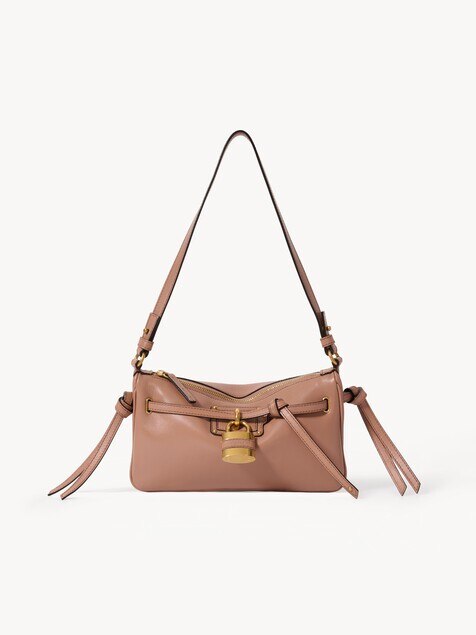 Minibolso pouch Paddington Sling con correa de cuero suave