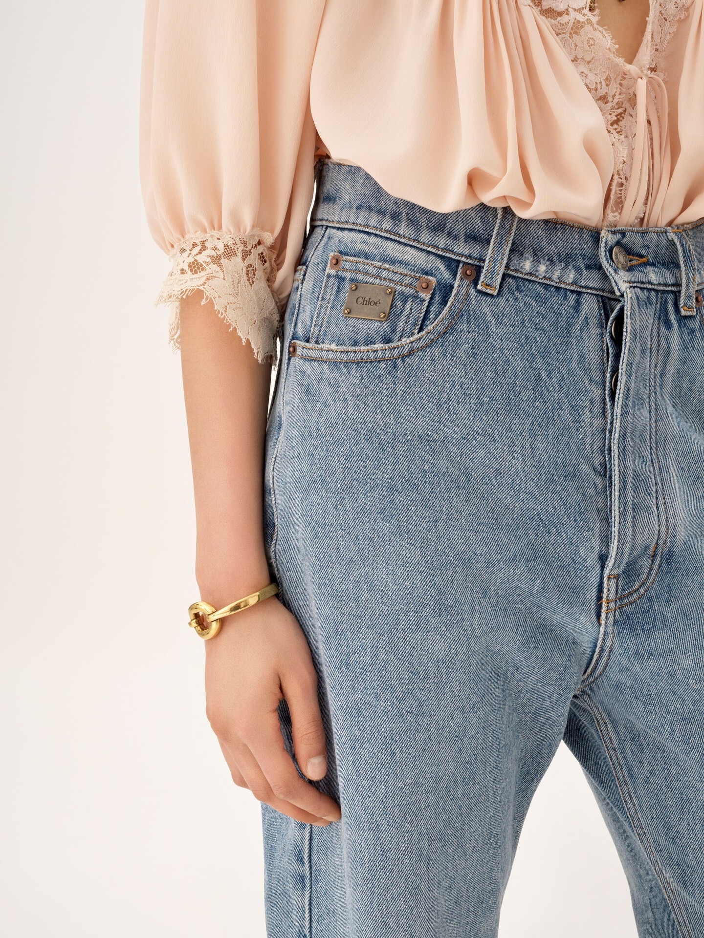 Jeans affusolati a vita alta in denim - 6