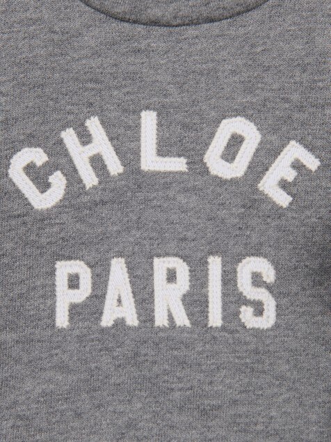 Sweat &agrave; volants et logo b&eacute;b&eacute;