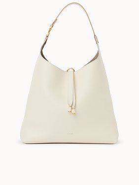 Bolso hobo Marcie Cuero de becerro granulado
Misty Ivory